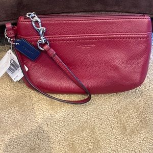 NWT Coach crimson-colored wristlet in cobbled leather